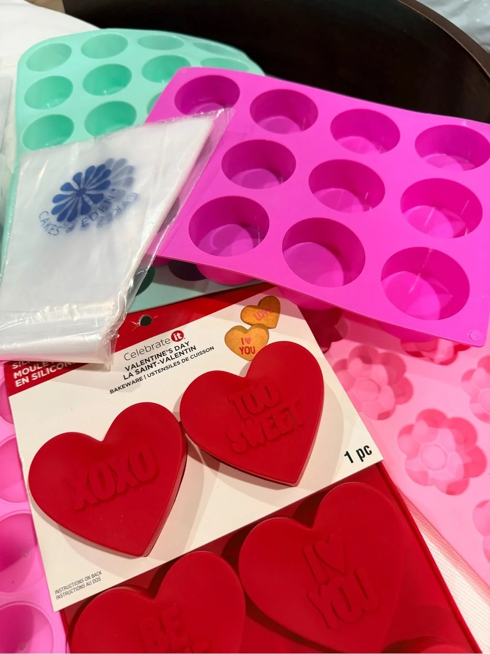 Cakes Of Eden (new) and a variety of (preowned) silicone molds